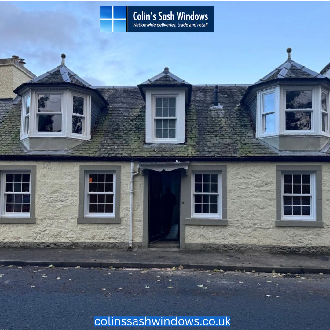 Double glazed white Upvc sash windows in a stylish home